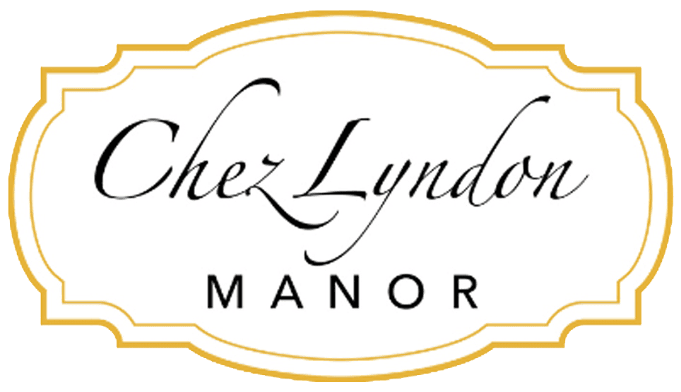 Logo of Chez Lyndon Manor in elegant script with a gold border.